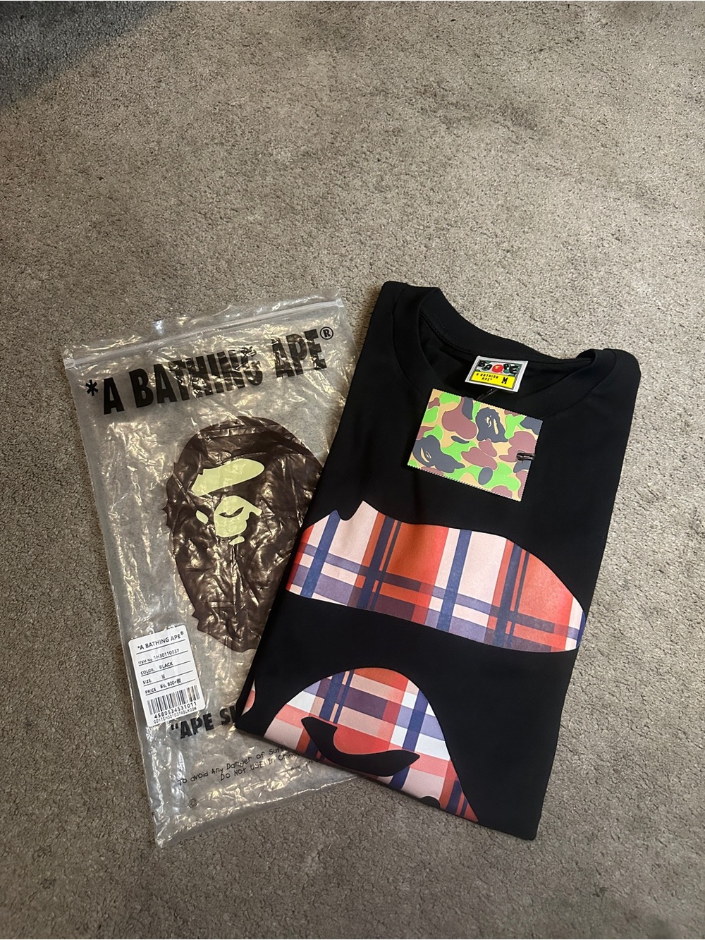 Bape Black Short Sleeve Tee with Pink & Red Plaid Ape Graphic